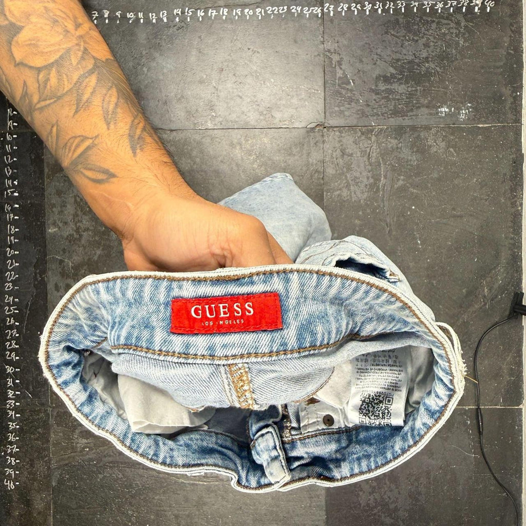 Guess slim tapered distressed jeans