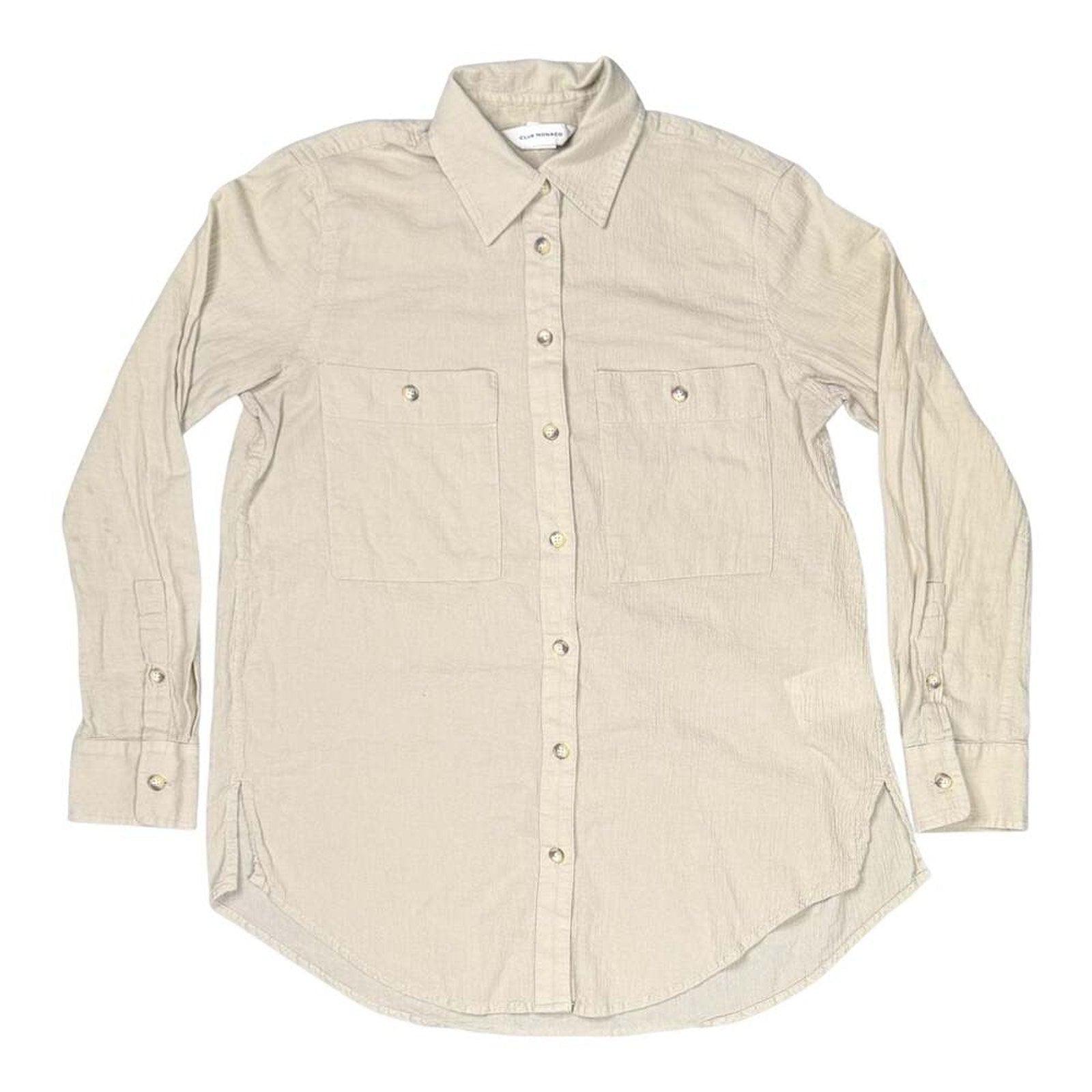 Club Monaco women's beige crinkle cotton button-down shirt, size XS, front view with dual chest pockets and curved hem.