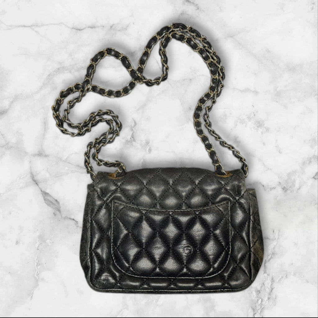 CHANEL Quilted Mini Flap Bag, Metallic Charocoal Leather, Silver-Tone Hardware.