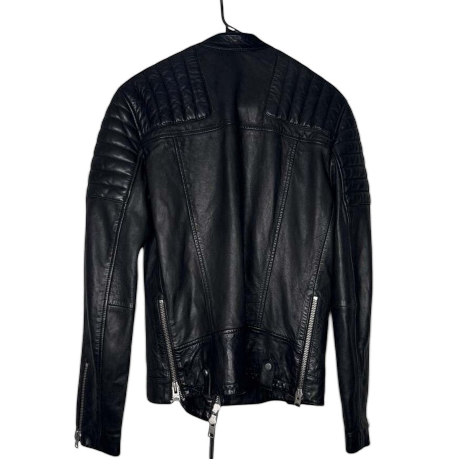 The Room Collective black leather biker jacket for men with quilted shoulders and zip details.
