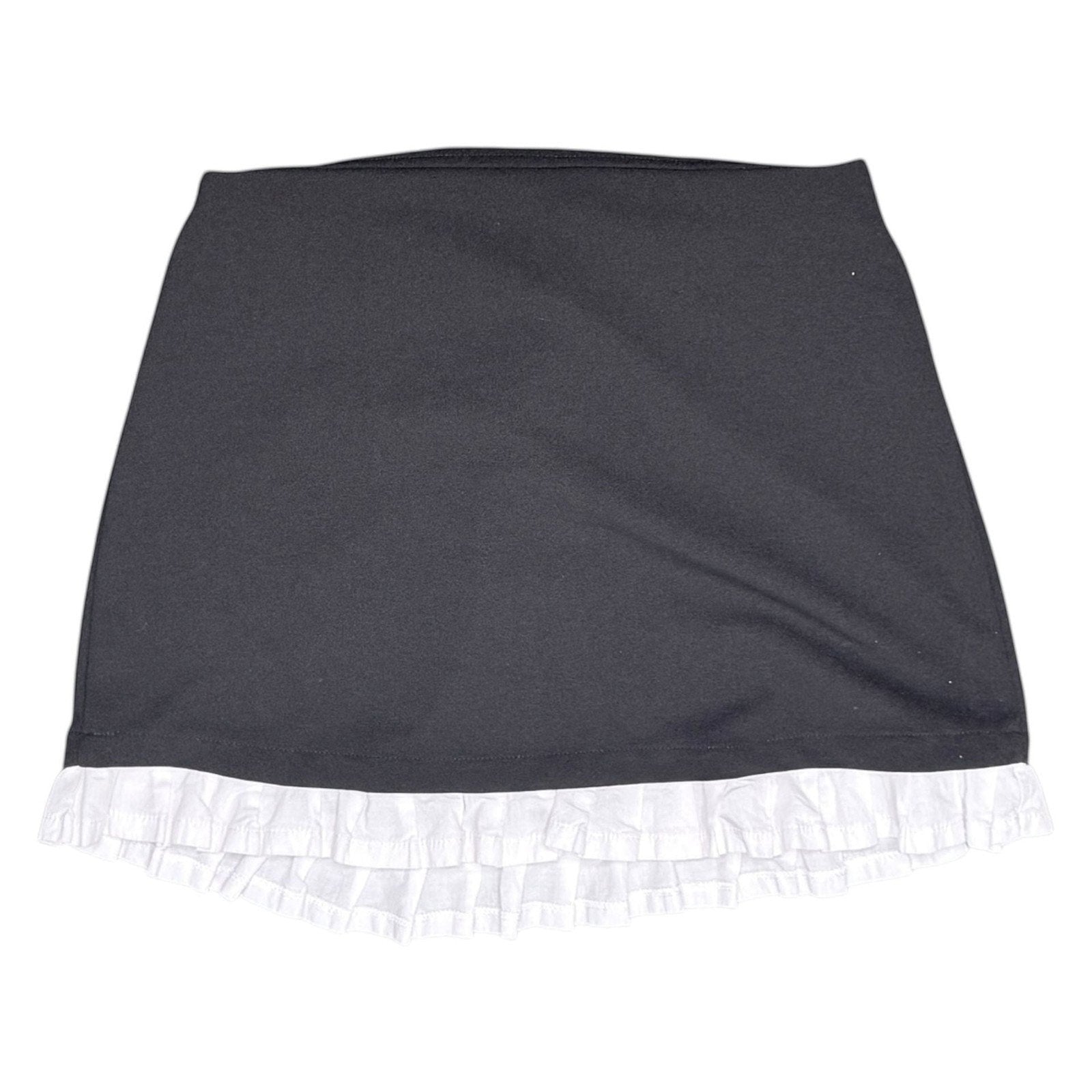 The Room Collective black mini skirt with white ruffled hem. High-waisted, slim fit, stretchy polyester/spandex blend with cotton ruffle.
