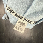 The Room Collective Victoria's Secret PINK light blue and white tie-dye hoodie with lace-up detail and chest logo, size M.