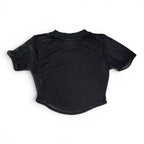 The Room Collective black Nike mesh short sleeve crop top with a white swoosh on the front, size XS.