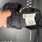 The Room Collective Riley black ruched nylon parachute skirt with back zipper and size S tag. Adjustable hem.