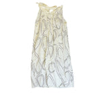 The Room Collective white mini dress with black abstract swirl print, halter neck, and tie-back detail. Lightweight crinkled fabric.