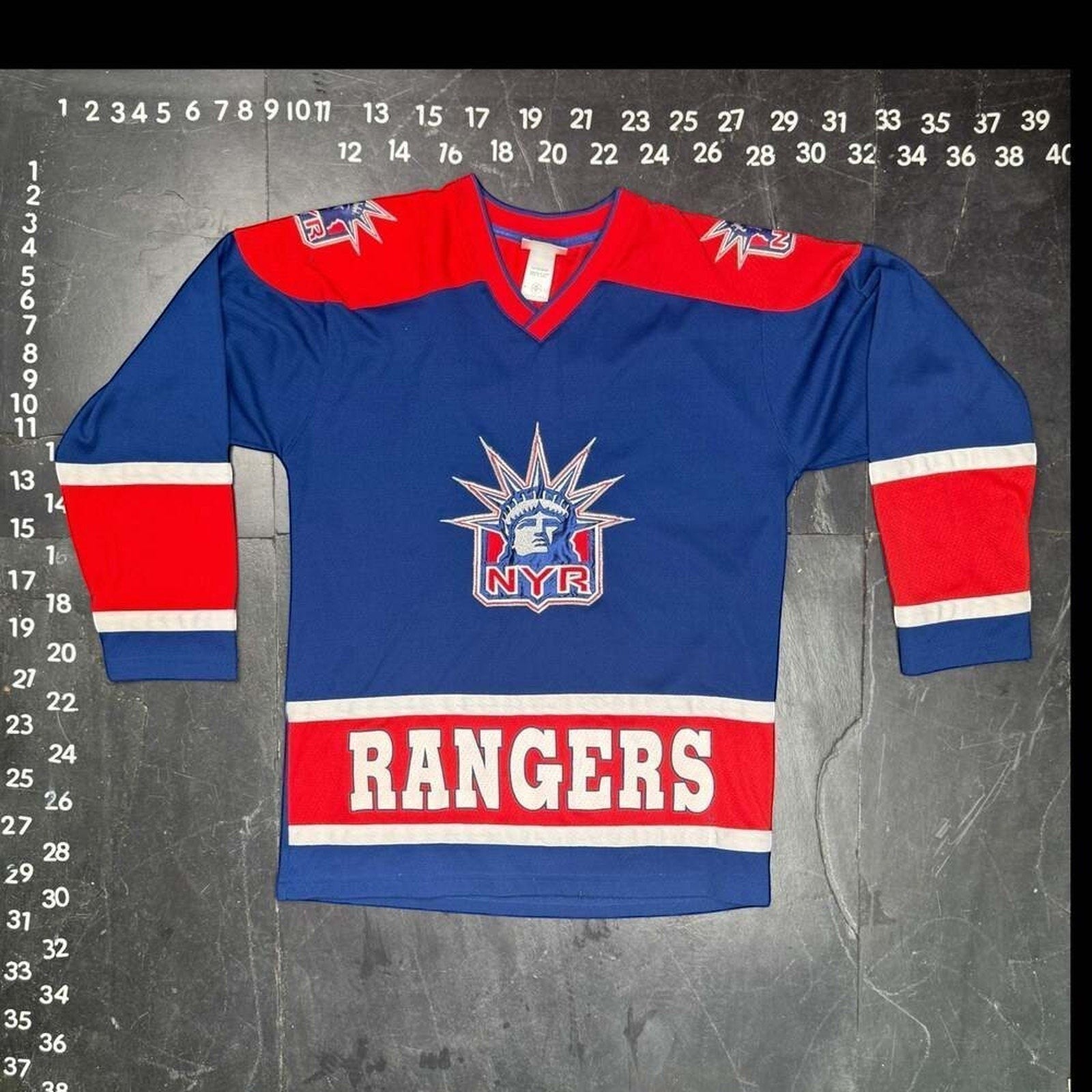 The Room Collective Vintage New York Rangers Brian Leetch Lady Liberty hockey jersey, size XL, blue with red accents and white trim.